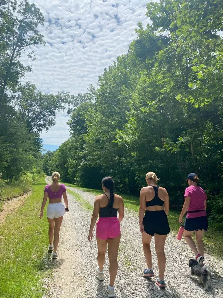 Group resting at a scenic overlook during a three-mile walk